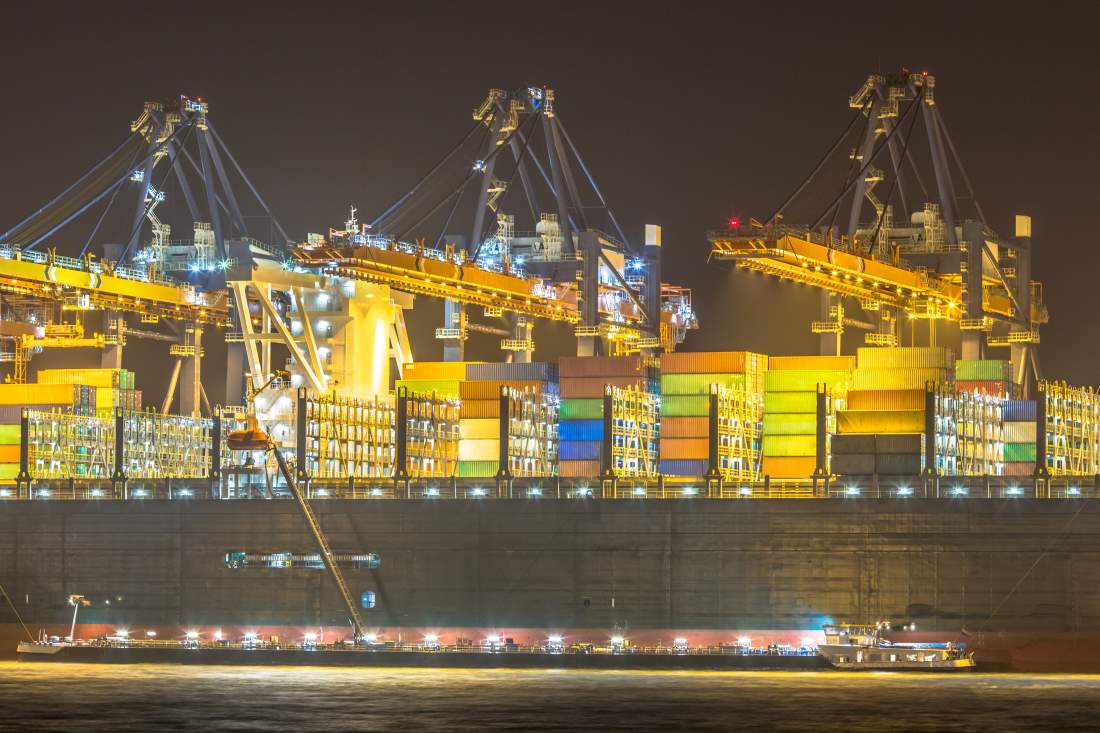 Cargo carrier ship being loaded