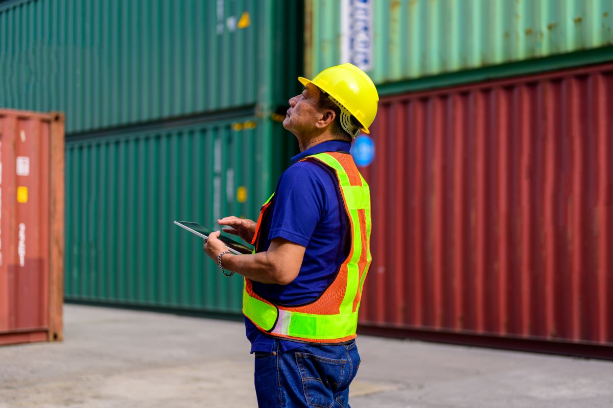 Warehouse engineer working at container yard