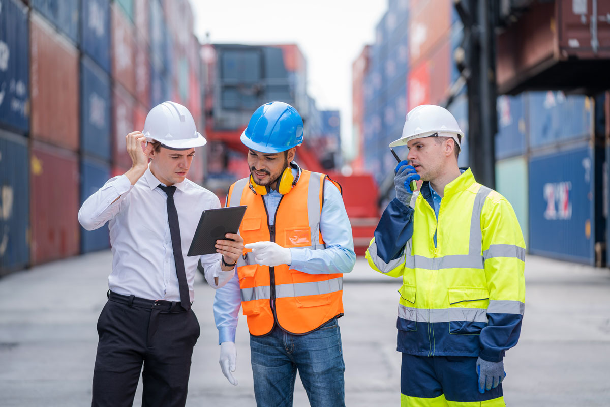 Terminal employees discussing excellence in terminal operations